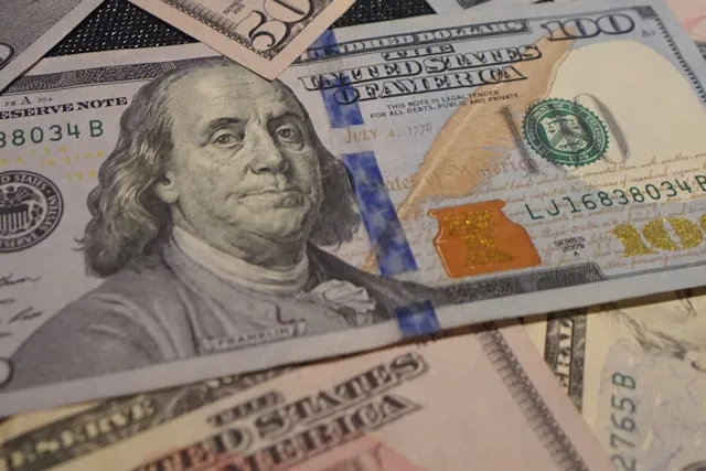 Person planning ahead with remaining settlement payments and financial documents