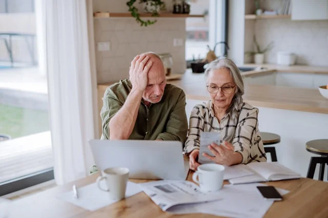 Couple reviewing their finances and future payment options together