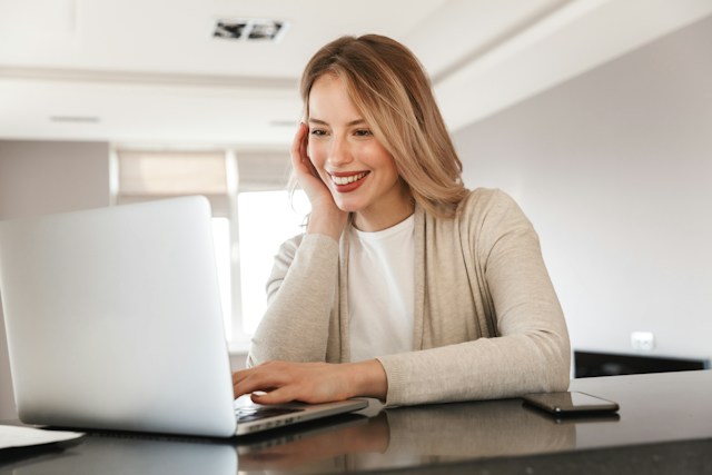 Woman reviewing information on a laptop, the first photo in the article