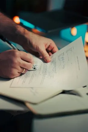 Person signing annuity tax documents