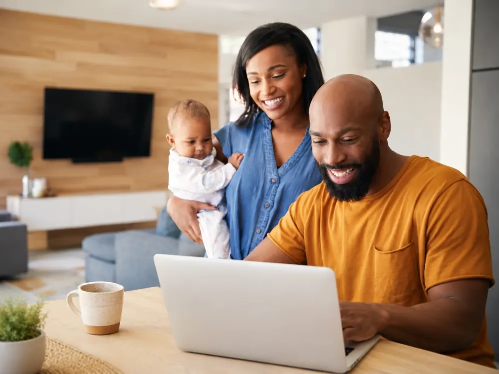 A family reviewing financial options together on a laptop